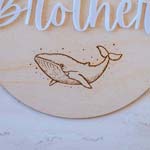 Big Brother announcement plaque whale