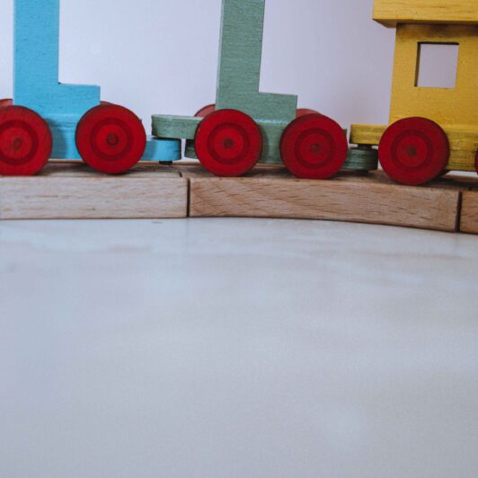 Personalised name train zoomed in on wheels and track
