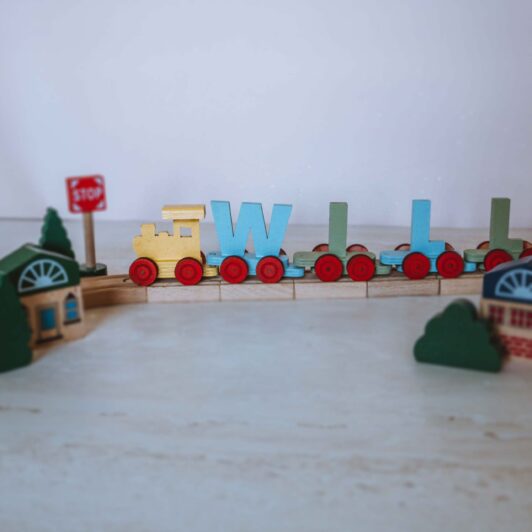Personalised name train with accessories